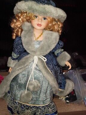 Collectors Choice Classic Porcelain Doll in Blue with Faux Fur Trim